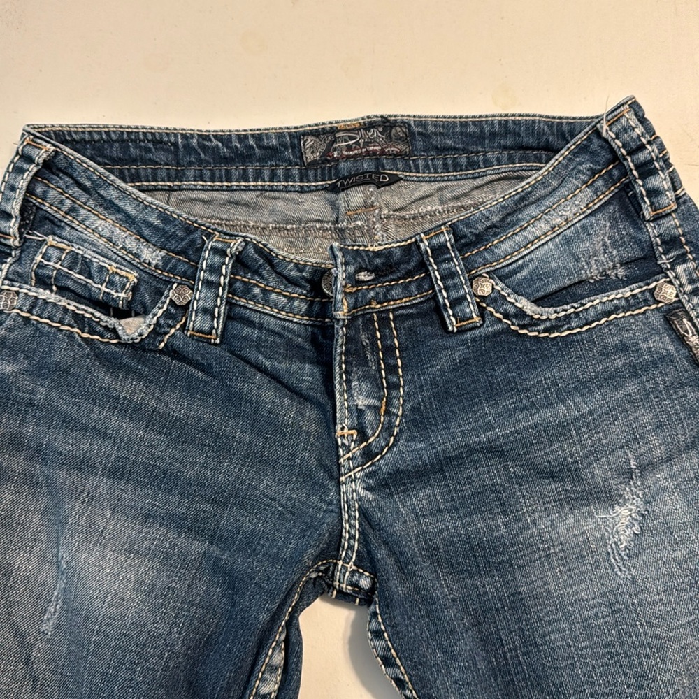 Silver twisted boot cut jeans